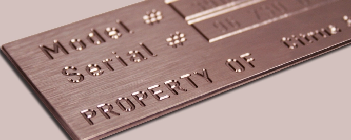 Deep engraved stainless steel metal tag.