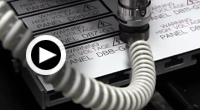 click to play Tri-Layer Electrical Tags Video.